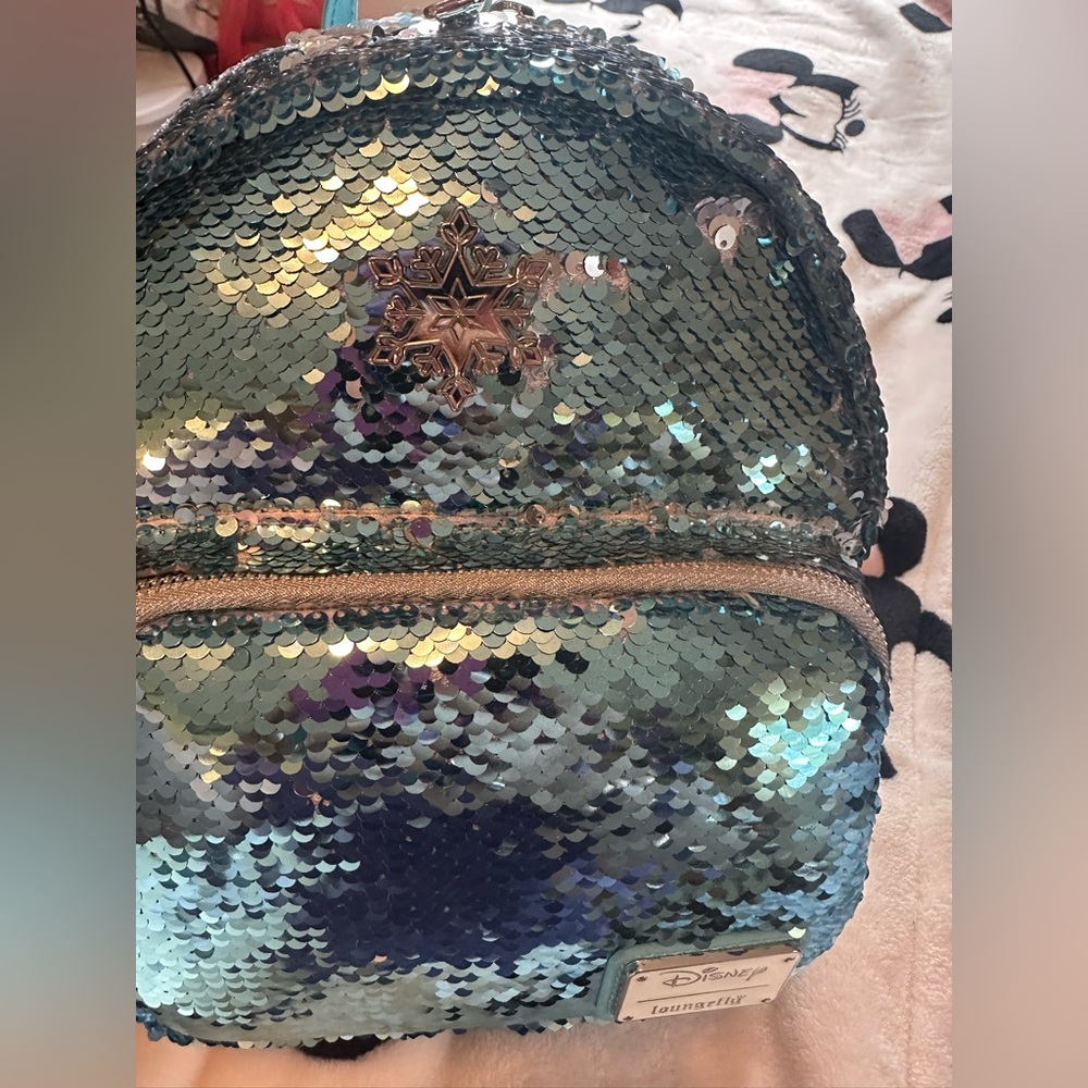 Disney Frozen Loungefly. Brand new. Price includes shipping and insurance.